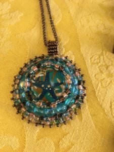 Beaded bezel (which is a bead). Another great color combination.