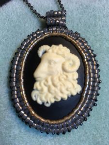 Beaded bezel with size 8 and 11 seed beads.