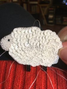 I started the finishing row and worried that the final row of beads looked silly. 